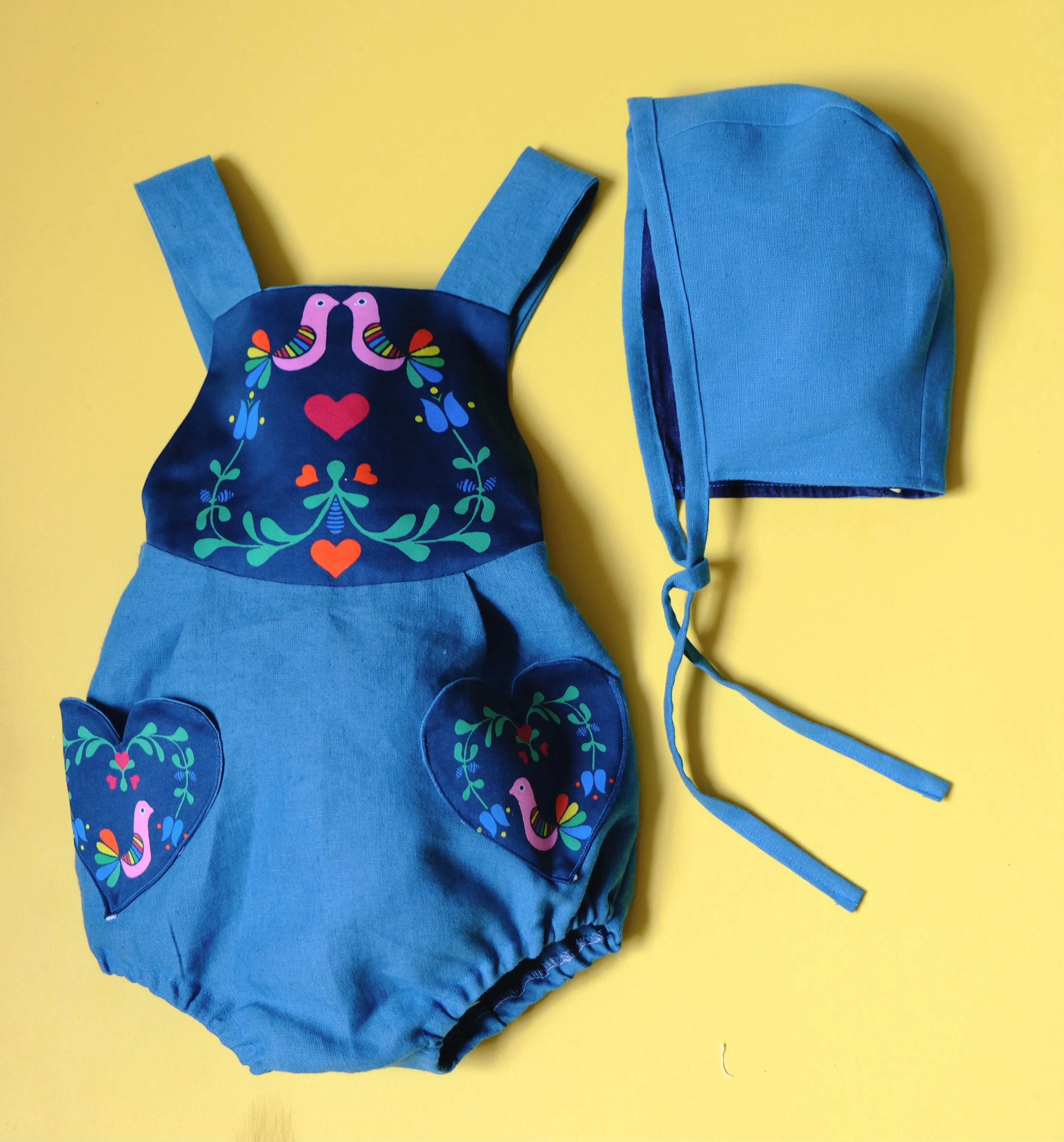 Love birds linen baby bubble romper in blue or mint